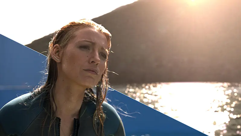 Bluescreen keying comparison of a woman in a sunlit lakeside environment